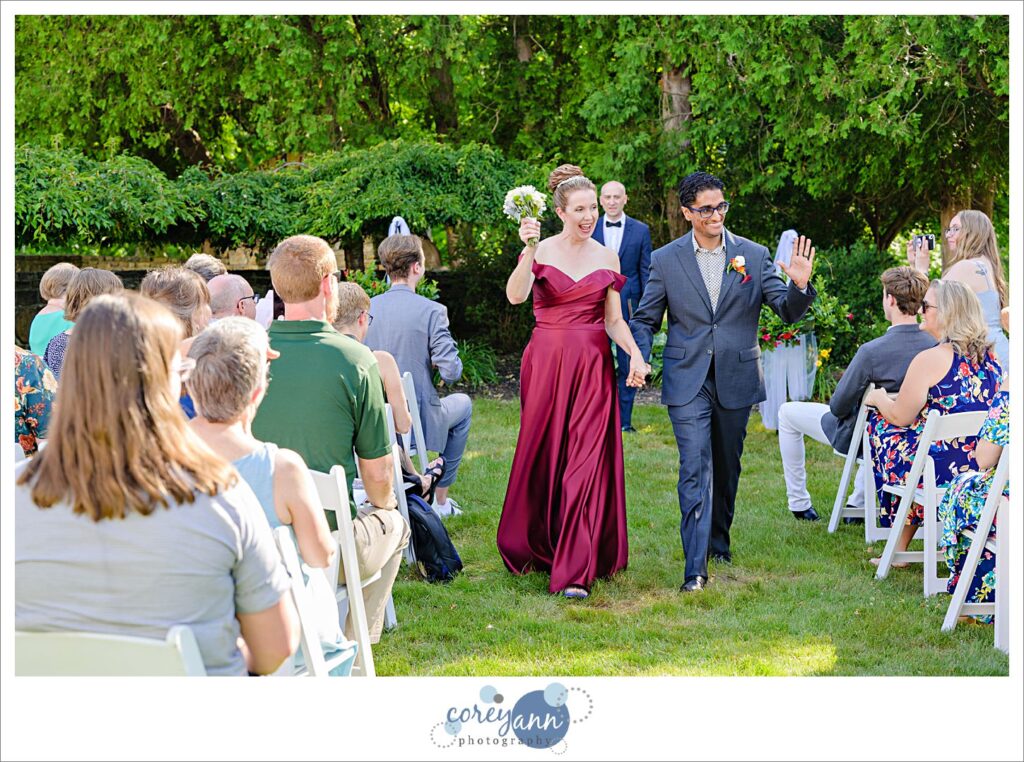 Outdoor wedding ceremony in the garden at Hawken Upper School in Gates Mills, Ohio