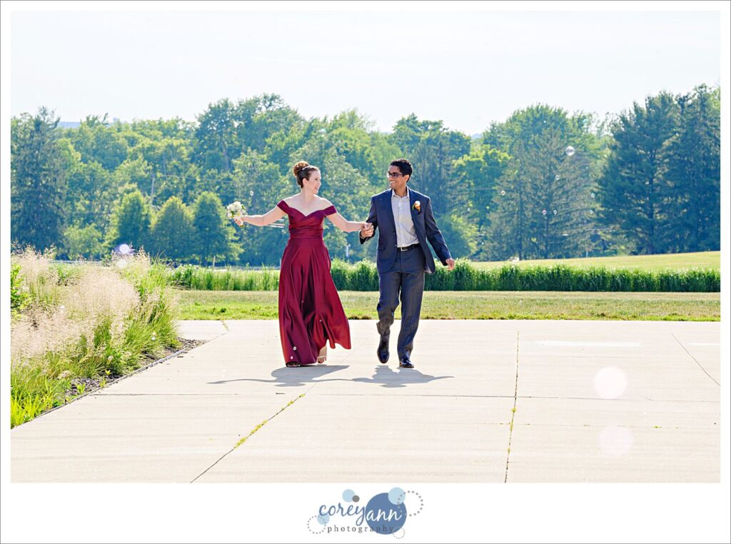 Outdoor wedding ceremony in the garden at Hawken Upper School in Gates Mills, Ohio