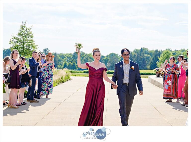 Outdoor wedding ceremony in the garden at Hawken Upper School in Gates Mills, Ohio
