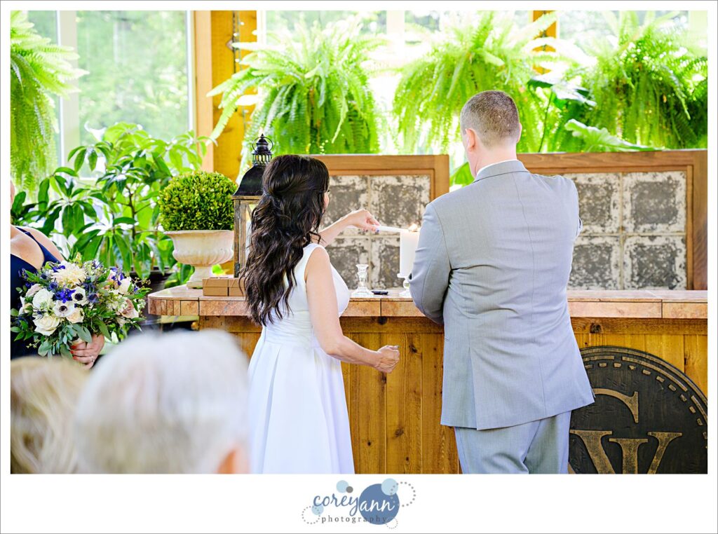 Wedding ceremony at Gervasi Vineyard in the conservatory in Canton Ohio