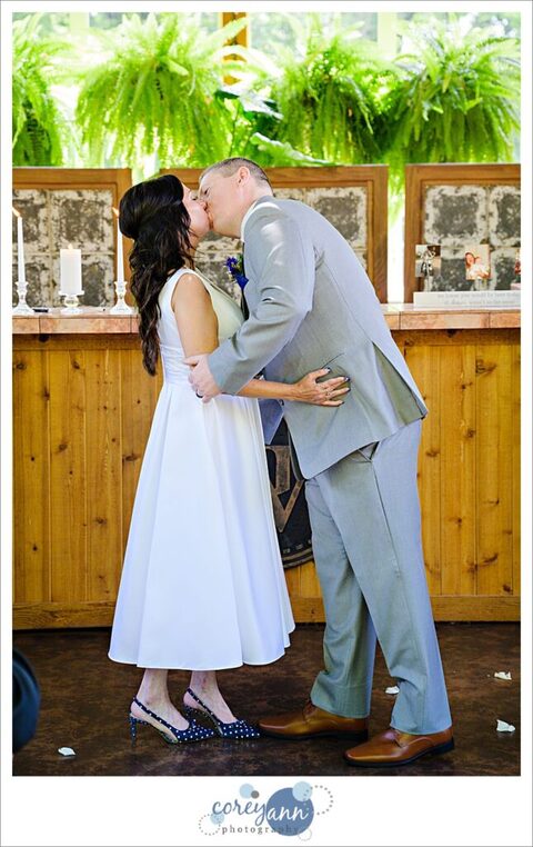 Wedding ceremony at Gervasi Vineyard in the conservatory in Canton Ohio