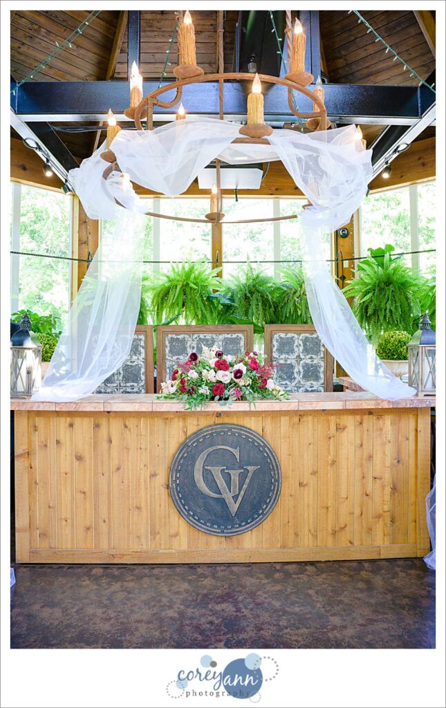 Wedding ceremony space set up inside the conservatory at gervasi vineyard in canton ohio