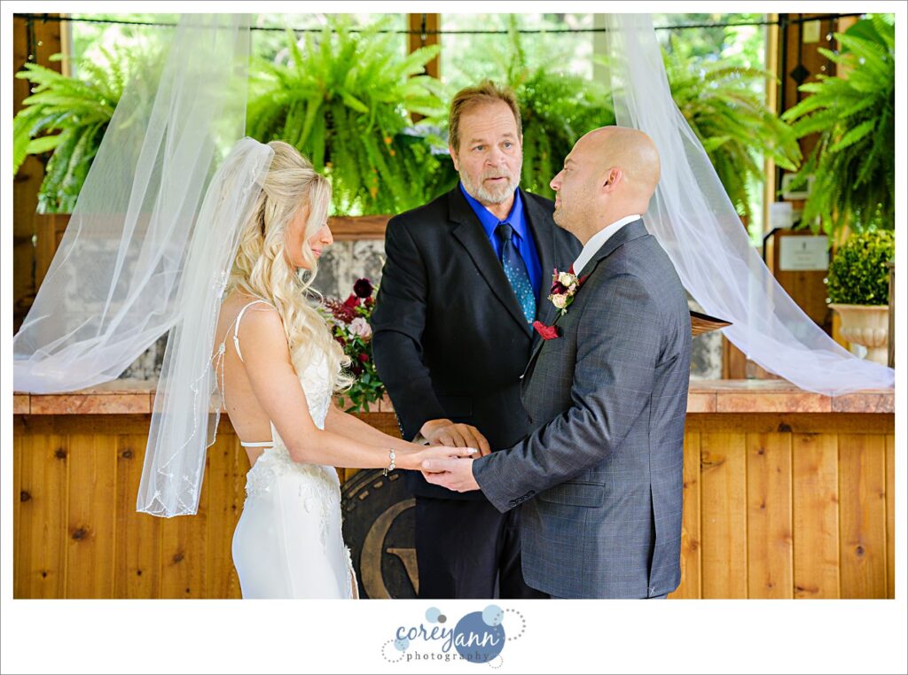 Wedding ceremony inside the conservatory at Gervasi Vineyard in Canton Ohio