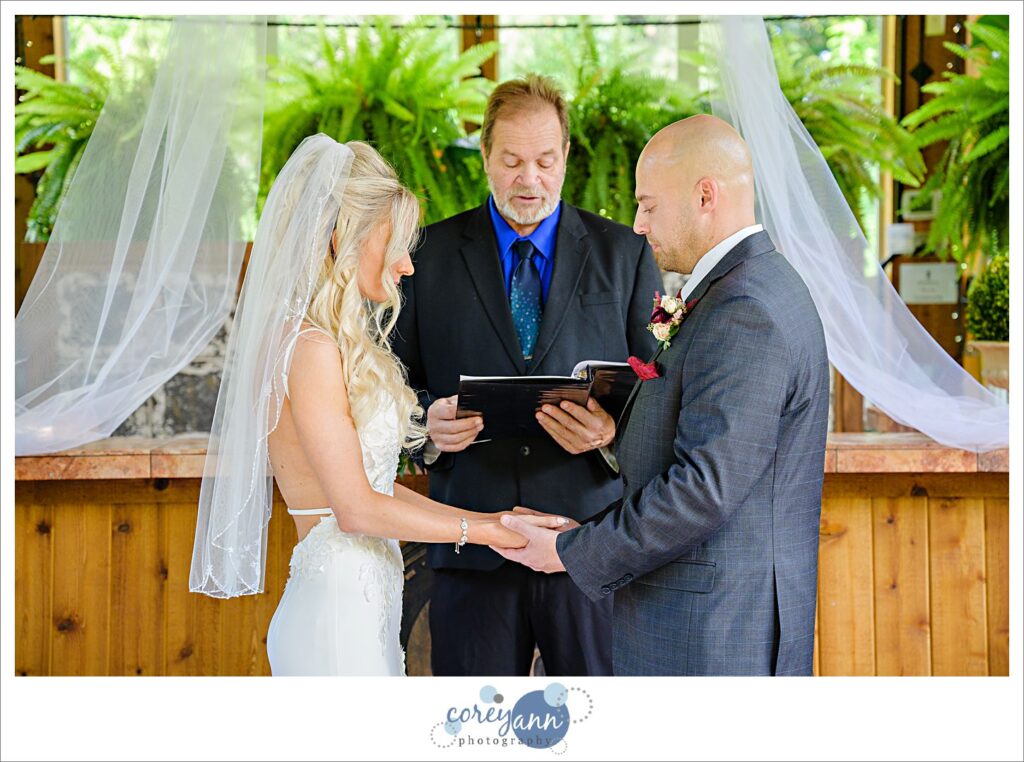 Wedding ceremony inside the conservatory at Gervasi Vineyard in Canton Ohio