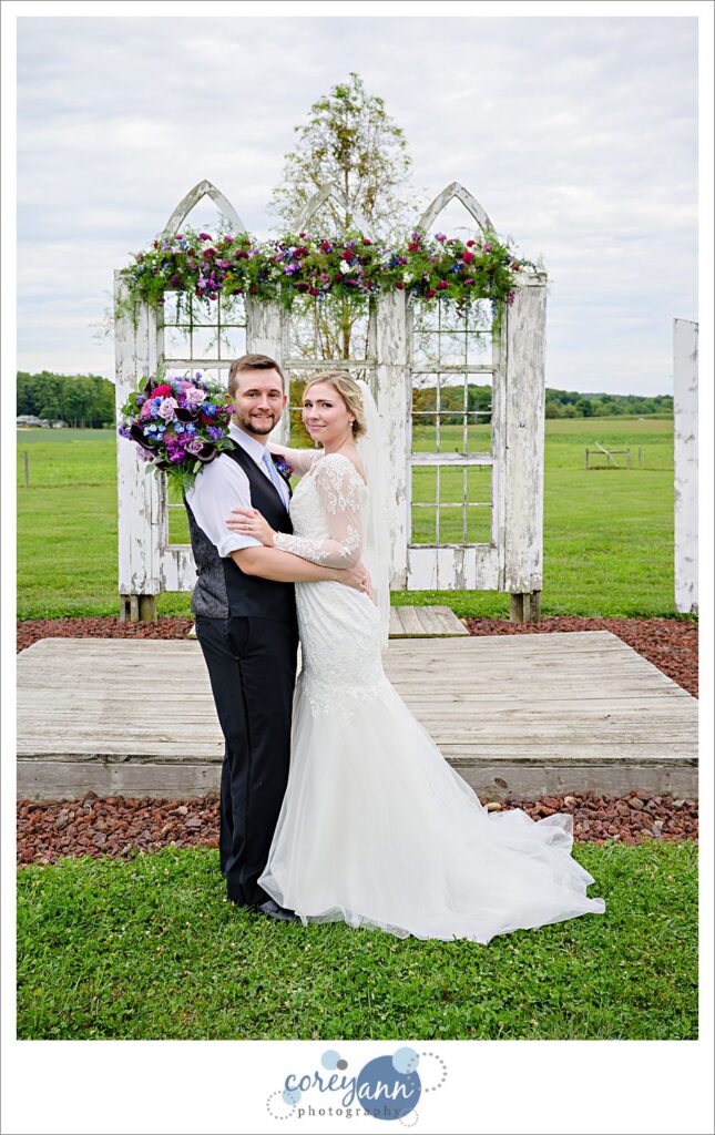 Casual portrait of bride and groom after wedding ceremony at Nickajack Farms in Ohio