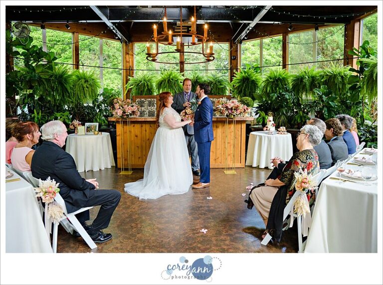Intimate wedding ceremony at conservatory at Gervasi Vineyard in Canton Ohio
