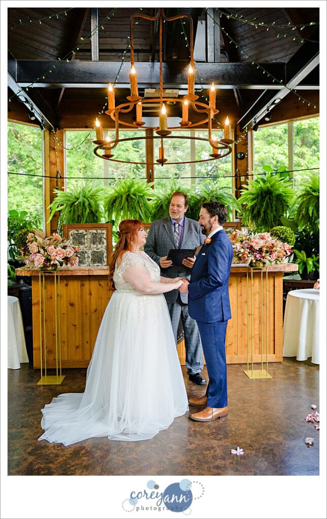 Intimate wedding ceremony at conservatory at Gervasi Vineyard in Canton Ohio