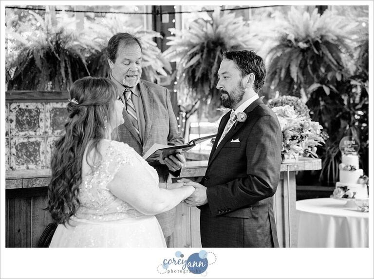 Intimate wedding ceremony at conservatory at Gervasi Vineyard in Canton Ohio