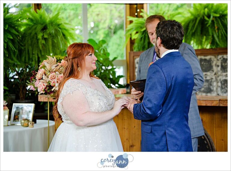 Intimate wedding ceremony at conservatory at Gervasi Vineyard in Canton Ohio