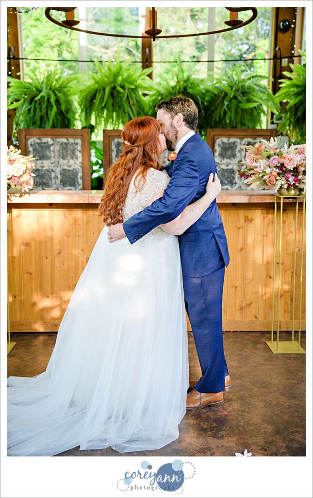 Intimate wedding ceremony at conservatory at Gervasi Vineyard in Canton Ohio