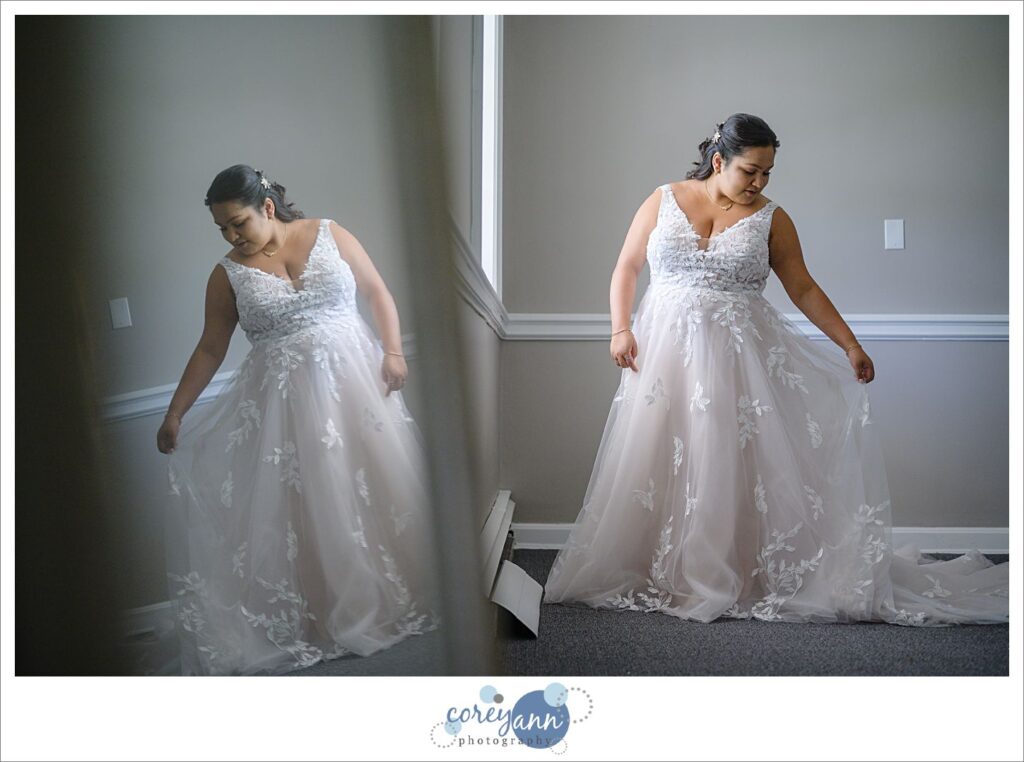 bride getting dressed for her wedding at manakiki golf course in  Willoughby Ohio