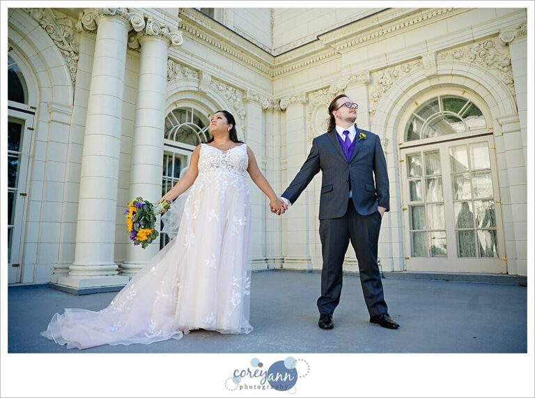 Bride and Groom posing after wedding at Coulby Mansion in Wickliffe Ohio
