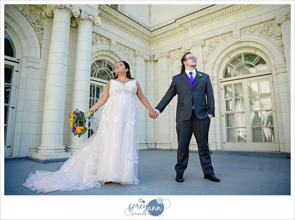 Bride and Groom posing after wedding at Coulby Mansion in Wickliffe Ohio
