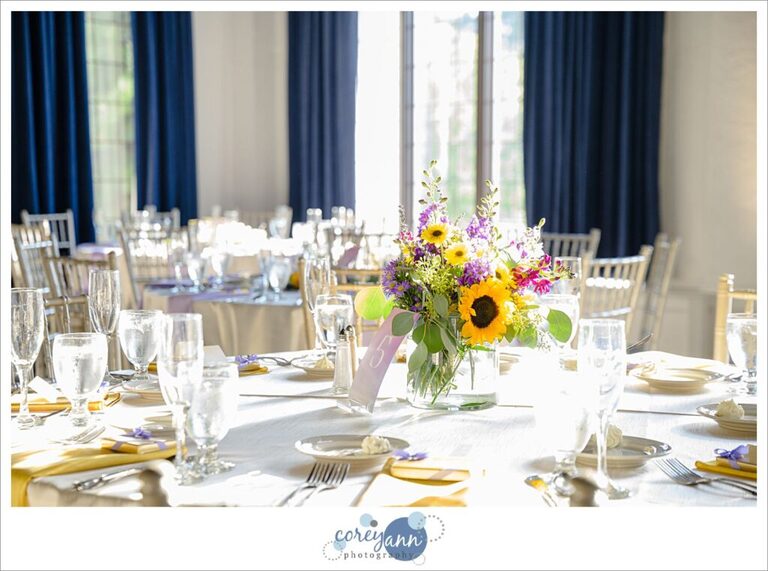 Sunflower wedding reception decor at Pine Ridge Country Club
