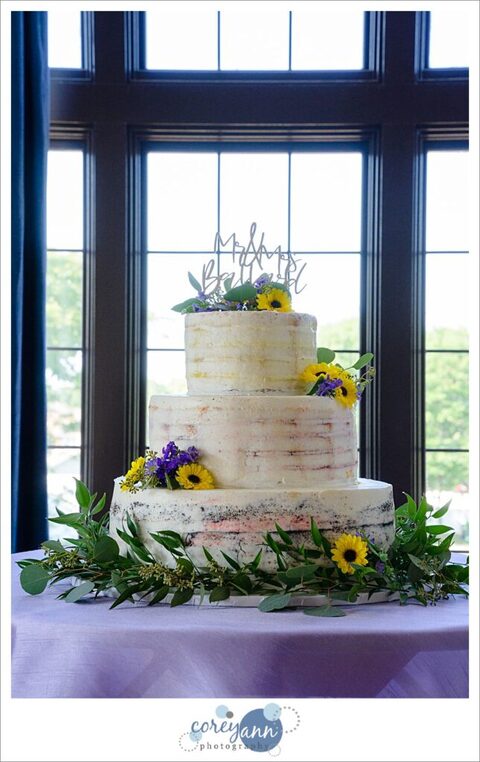 Sunflower nearly naked wedding cake by Corbo's Bakery