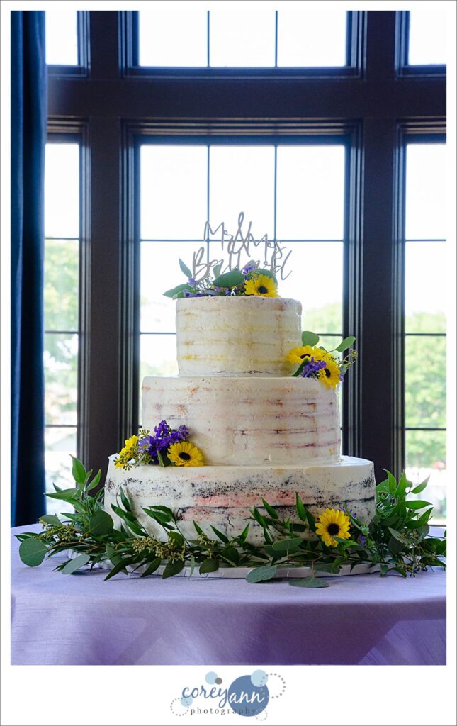 Sunflower nearly naked wedding cake by Corbo's Bakery