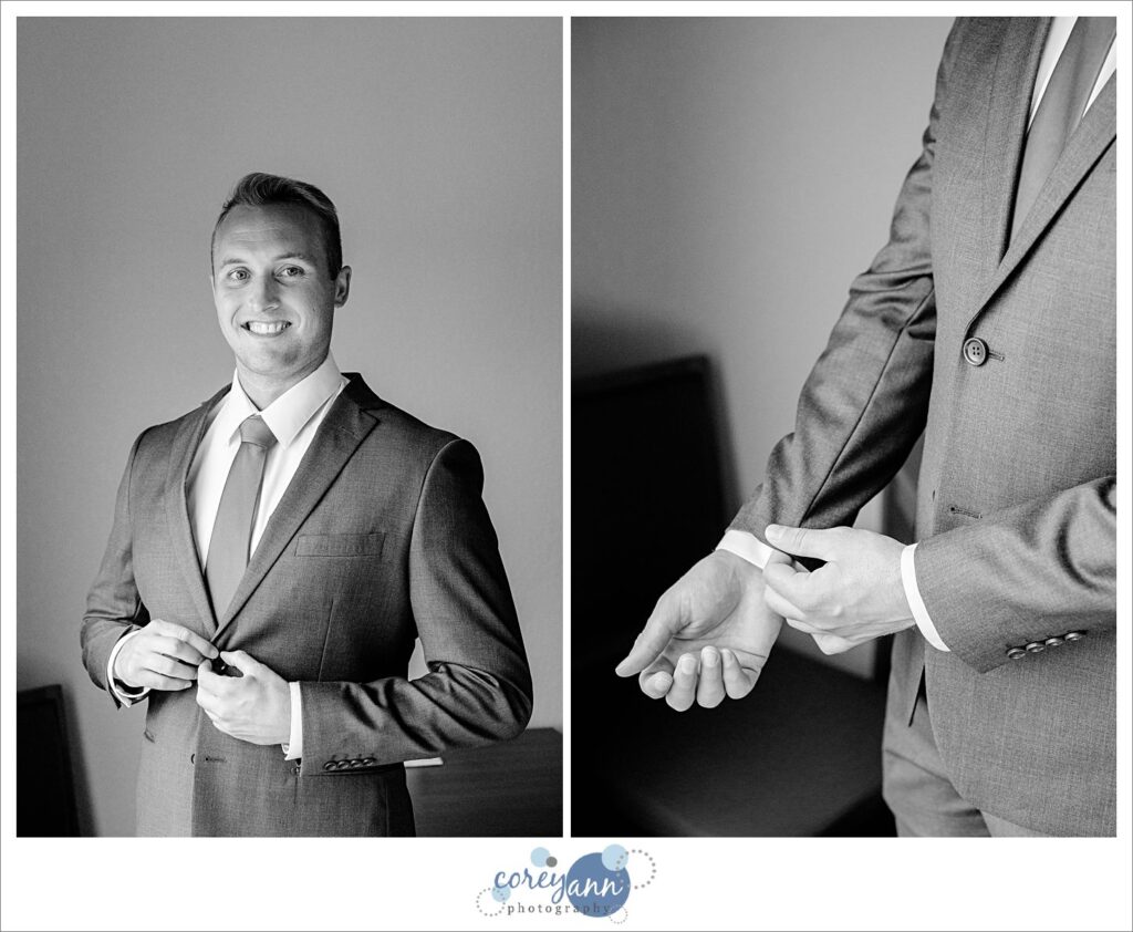 groom getting dressed for wedding at Holiday Inn Express in Akron Ohio