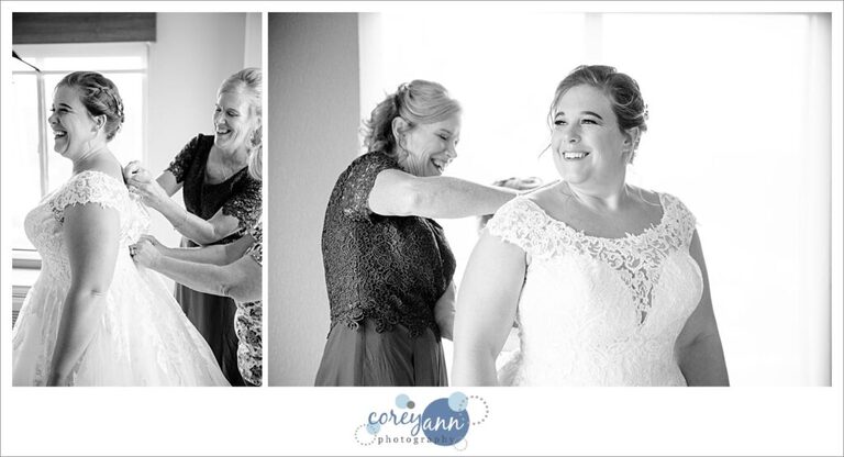Bride getting dressed for wedding at Holiday Inn Express in Akron Ohio