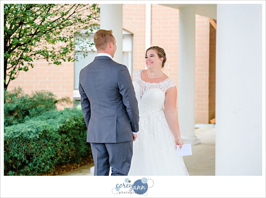 Bride and Groom first look at Holiday Inn Express in Akron Ohio
