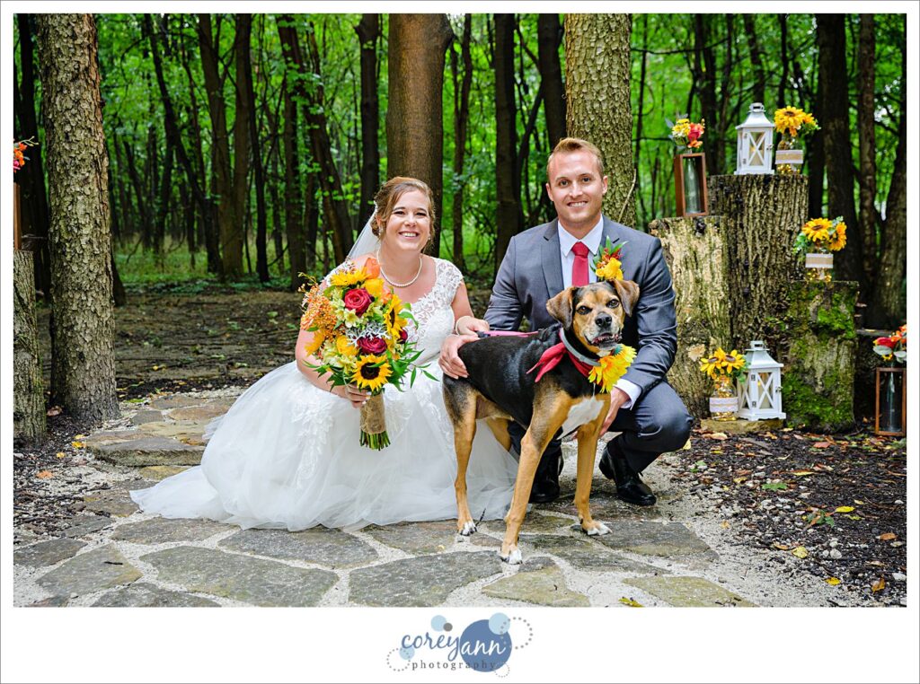 Bride and groom and their dog at Gather at the Lakes in their outdoor ceremony space