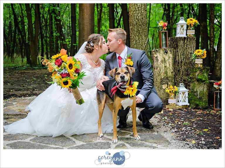 Bride and groom and their dog at Gather at the Lakes in their outdoor ceremony space