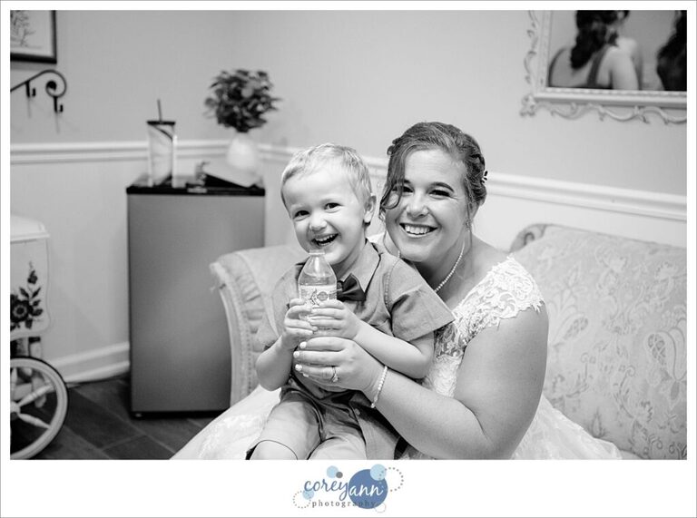 Bride and her nephew being cute before wedding ceremony 