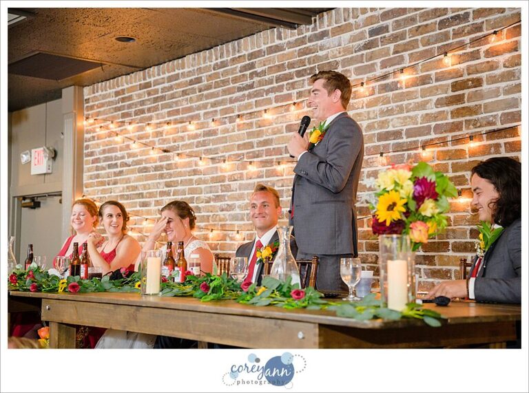 Toasts at wedding reception at Gather at the Lakes in Akron Ohio