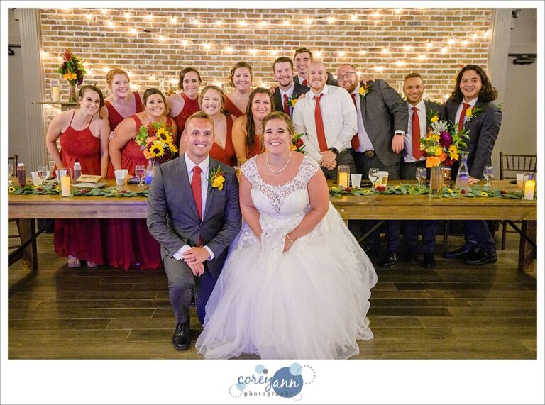 Bride and groom doing wedding table dash during reception at Gather at the Lakes