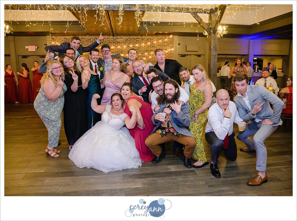 Bride and groom doing wedding table dash during reception at Gather at the Lakes