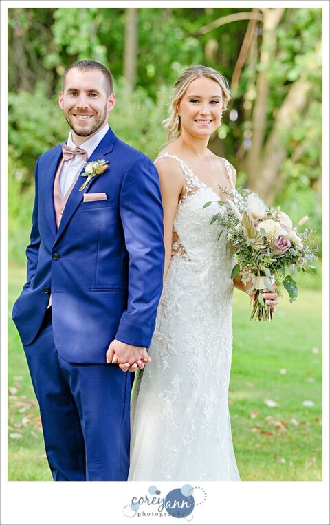 Casual portrait with bride and groom after wedding at the Tudor House on Portage Lakes in Akron Ohio