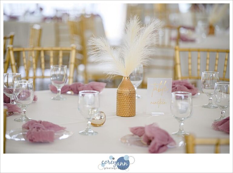 Pink and gold boho decor for a wedding reception at Tudor House on Portage Lakes