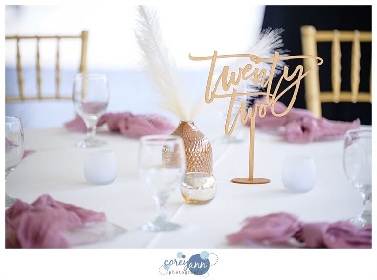 Pink and gold boho decor for a wedding reception at Tudor House on Portage Lakes