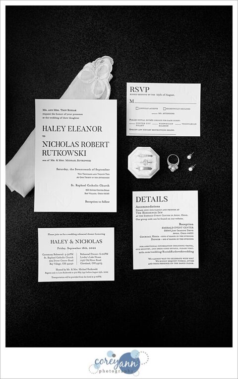 Wedding day flatlay with invitation suite and other details