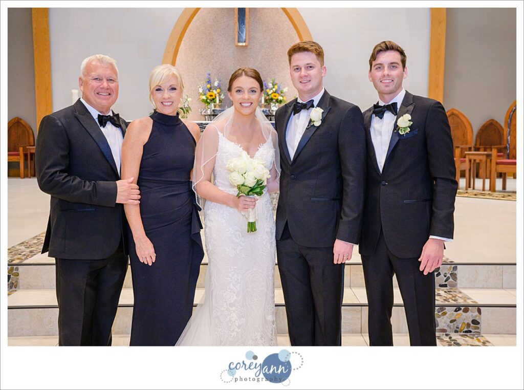 Family portraits at St. Raphael Parish after wedding ceremony in Ohio