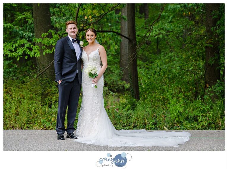 Bride and groom pose casually after wedding in Avon, Ohio