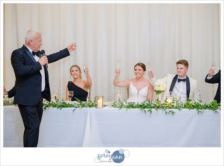 Toasts being given to bride and groom during their wedding reception at Emerald Event Center in Avon Ohio