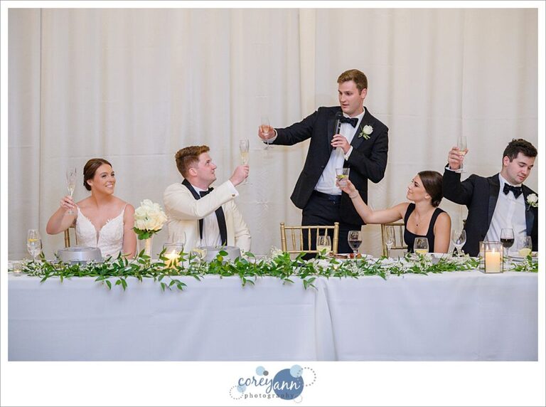 Toasts being given to bride and groom during their wedding reception at Emerald Event Center in Avon Ohio