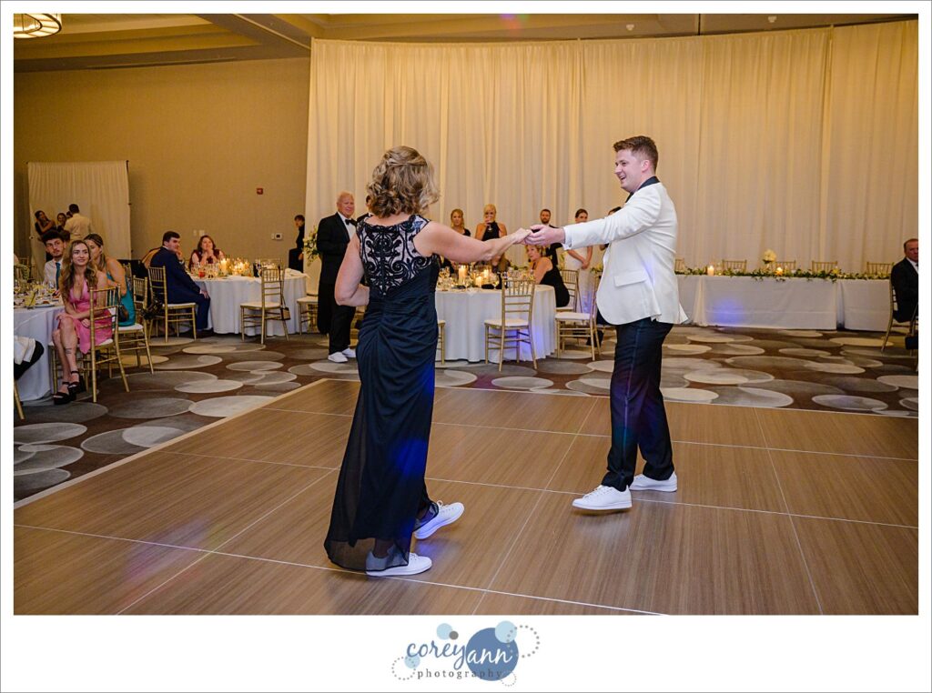 Groom and his mother dancing during wedding reception at Emerald Event Center in Avon Ohio