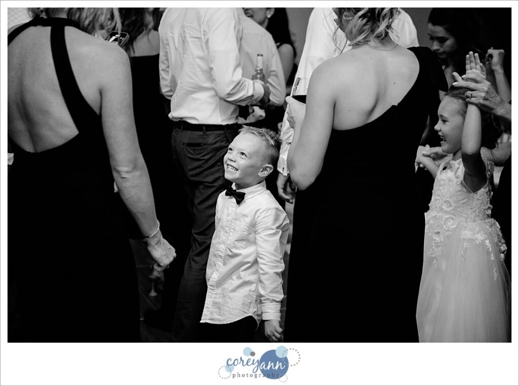 Fun wedding dance floor during wedding reception at Emerald Event Center September wedding in Northeast Ohio