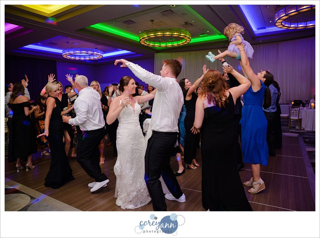 Fun wedding dance floor during wedding reception at Emerald Event Center September wedding in Northeast Ohio