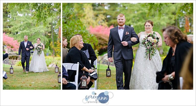 Bride walking down the aisle at Tudor House on Portage Lakes with her brother