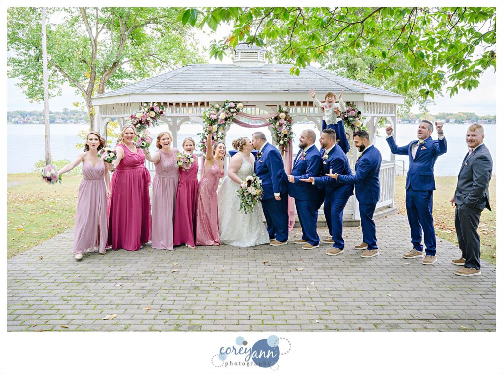 Fun bridal party pose at Tudor House at Mason's Cove in Akron Ohio
