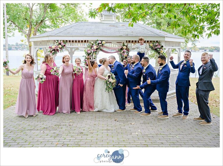 Fun bridal party pose at Tudor House at Mason's Cove in Akron Ohio