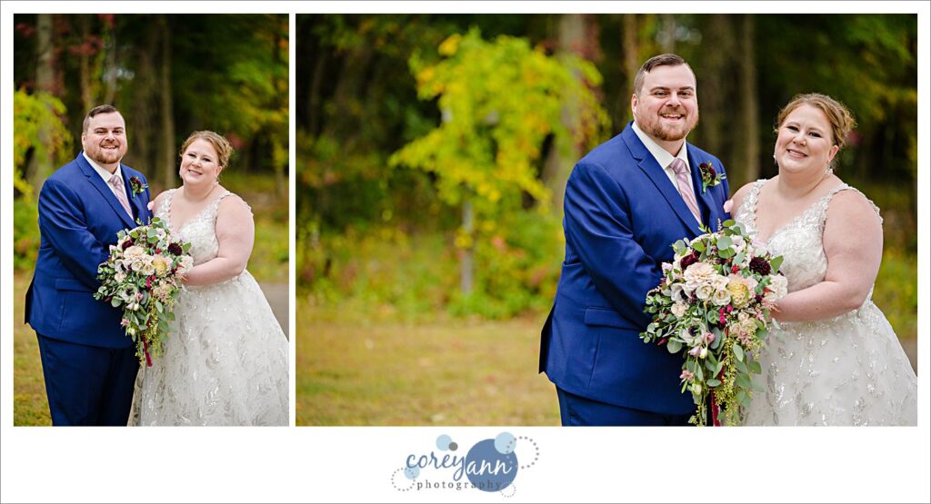 Bride and groom smiling at the camera during their wedding day at Tudor House on Portage Lakes