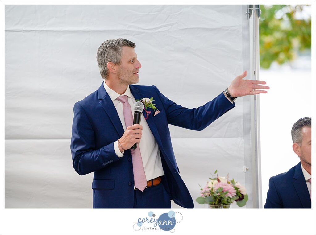 Brother of Bride giving emotional toast during wedding reception at Tudor House on Portage Lakes