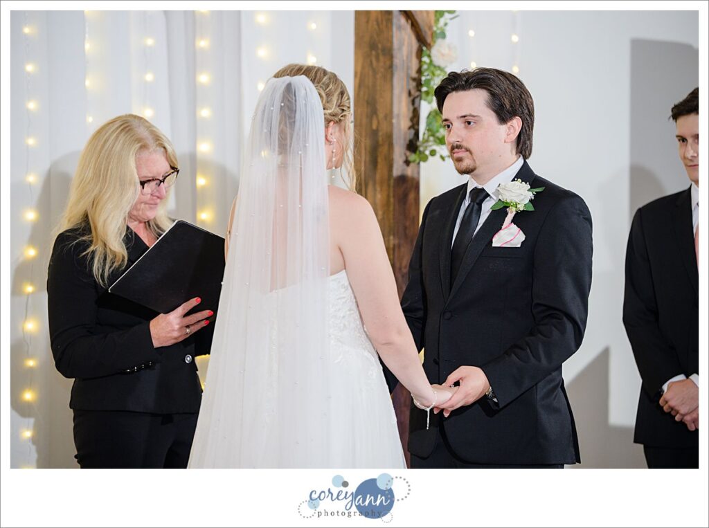 Indoor wedding ceremony at The Barn of Canal Fulton due to rain
