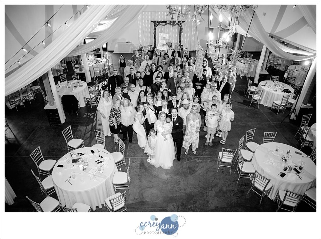 Photo of all attendees at wedding at The Barn of Canal Fulton