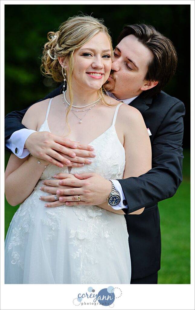 Outdoor photos of bride and groom in the rain at The Barn of Canal Fulton in Ohio