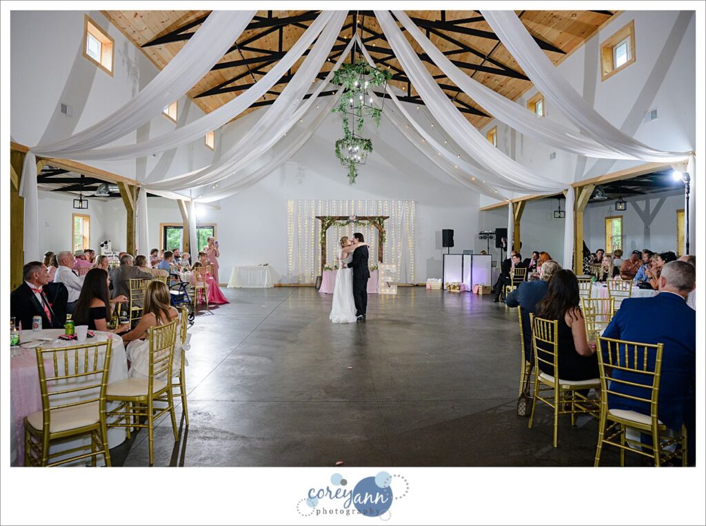Bride and Groom first dance during wedding reception at The Barn of Canal Fulton