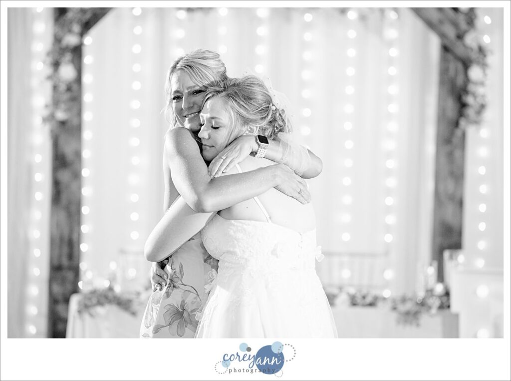 Bride and Mom dance at wedding reception at The Barn of Canal Fulton